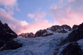 Mountain glaciers and peaks landscape at sunrise