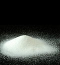 A Mountain of Granulated Sugar on a Black Background Royalty Free Stock Photo