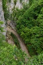 Mountain gravel road through canyon