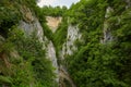 Mountain gravel road through canyon