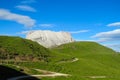 Mountain green hill and unparved road Royalty Free Stock Photo