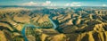 Mountain green hills panorama with curvy river