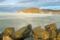 The mountain `Hedgehog` in the rays of the rising sun in the misty morning, Dzhubga Royalty Free Stock Photo