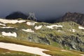 Mountain high voltage pylon, Italian Alps. Royalty Free Stock Photo