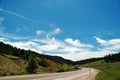 Mountain Highway and Rainbow Cloud Royalty Free Stock Photo