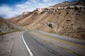 Mountain highway road in mountains . Andes mountains landscape with rocky cliffs. Sharp curve road. Mendoza province Royalty Free Stock Photo