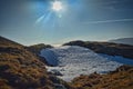 landscape of a snow field in the backlit Royalty Free Stock Photo
