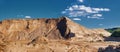 Mountain, hill of quarry and river sand, blue sky with white clouds. Dune, canyon, desert Royalty Free Stock Photo