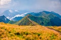 Mountain hills after the rain. Dramatic summer scene of Krasna range with old country road. Royalty Free Stock Photo