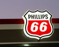 Lit up Phillips 66 gas station sign at night Royalty Free Stock Photo