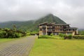 Mountain and house in rain Royalty Free Stock Photo