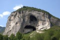 mountain with huge cave-in, showing the interior of the mountain and its geological structure