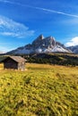 Mountain hut with beautiful peak on the background at passo Erbe, Dolomites, Italy