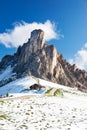 Mountain hut and Nuvolau peak after a summer snowfall. Royalty Free Stock Photo