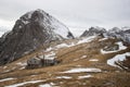 Mountain hut in snowy alpine landscape