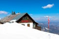 Mountain hut with spectacular view in snowy landscape. Royalty Free Stock Photo