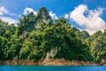 Mountain island full of green tree.