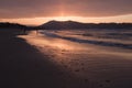 Mountain Jaizkibel backlit on atlantic coastline in beautiful pink sunset, hendaye, france Royalty Free Stock Photo