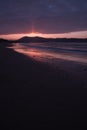 Mountain Jaizkibel backlit on atlantic coastline in beautiful pink sunset, hendaye, france Royalty Free Stock Photo