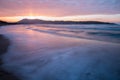 Mountain Jaizkibel backlit on atlantic coastline in beautiful pink sunset, hendaye, france Royalty Free Stock Photo