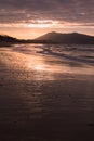 Mountain Jaizkibel backlit on atlantic coastline in beautiful pink sunset, hendaye, france Royalty Free Stock Photo