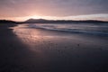 Mountain Jaizkibel backlit on atlantic coastline in beautiful pink sunset, hendaye, france Royalty Free Stock Photo