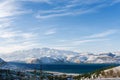 Mountain lake Charvak in Uzbekistan on a snowy frosty day, surrounded by the Tien Shan mountains. Chimgan Pyramids Royalty Free Stock Photo