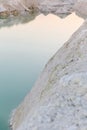 Mountain lake with emerald water at sunset