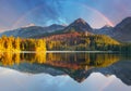 Mountain lake landscape with rainbow - Slovakia, Strbske pleso Royalty Free Stock Photo