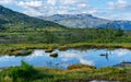 Mountain lake landscape, way to Trolltunga rock, Odda, Norway Royalty Free Stock Photo