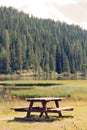 Mountain Lake Misurina. Beautiful tourist place to stay. table and bench Royalty Free Stock Photo