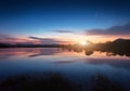 Mountain lake with moonrise at night. Night landscape