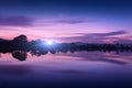 Mountain lake with moonrise at night. Night landscape