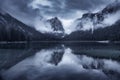 Mountain lake in overcast rainy day in spring. Dramatic landscape Royalty Free Stock Photo