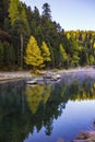 Mountain lake panorama with mountains reflection