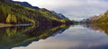 Mountain lake panorama with mountains reflection. Idyllic look. Autumn forest. Silvaplana Lake, Royalty Free Stock Photo