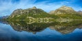 Mountain lake panorama with mountains reflection. Idyllic look. Autumn forest. Silvaplana Lake, Royalty Free Stock Photo