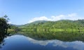 Mountain and Lake with reflex in the water scenery beautiful view with blue sky and clouds in phuket thailand Royalty Free Stock Photo