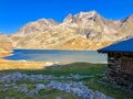 Mountain lake and refuge, French Alps Royalty Free Stock Photo