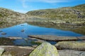 Mountain lake in tundra landscape, Norway. Royalty Free Stock Photo