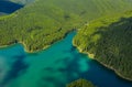 Mountain lake with turquoise water and green trees. Reflection in the water. Beautiful summer landscape with mountains, forest and Royalty Free Stock Photo