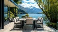 Luxury Lakeside Dining Patio with Mountain and Lake View Royalty Free Stock Photo