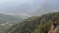 Mountain land of Bhutan with vegetation. Buddhist monastery