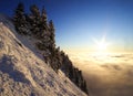 Mountain landscape above a sea of clouds at sunset Royalty Free Stock Photo