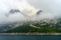 Mountain landscape along the road to Fedaia pass, Dolomites. Lake Royalty Free Stock Photo