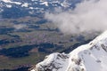 Mountain landscape in the Alps - white clouds between the peaks Royalty Free Stock Photo