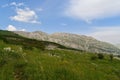 Mountain landscape in altitude in Lebanon green meadow and desertic summit