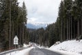 Mountain landscape with asphalt road and forest Royalty Free Stock Photo