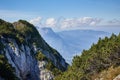 Mountain landscape in Austria, cloudy, forests, rocks, city in the mountains, summer