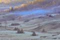 Mountain landscape with autumn morning fog at sunrise - Fundatura Ponorului, Romania Royalty Free Stock Photo